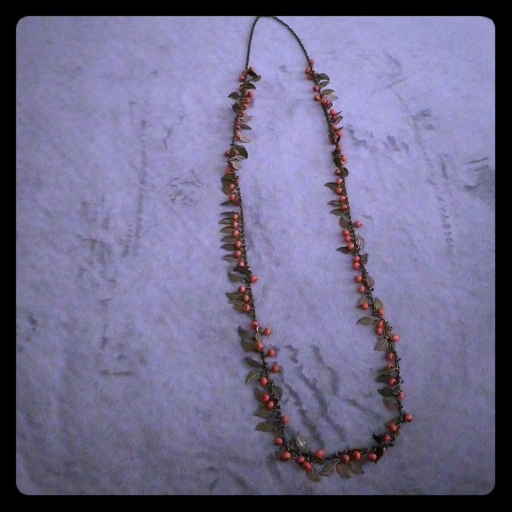 Orange feathered necklace